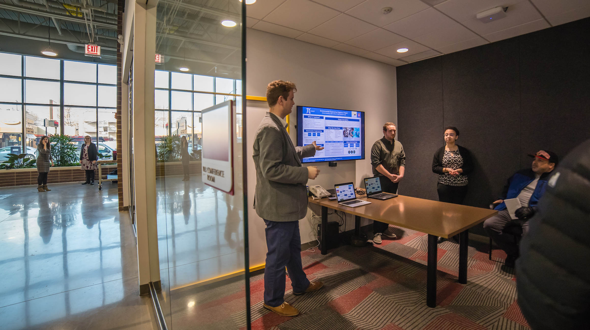 Engineering capstone team meeting with industry mentor